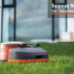 Segway Navimow H Satelliten Rasenroboter vor Haus Fenster im Rasen EU9